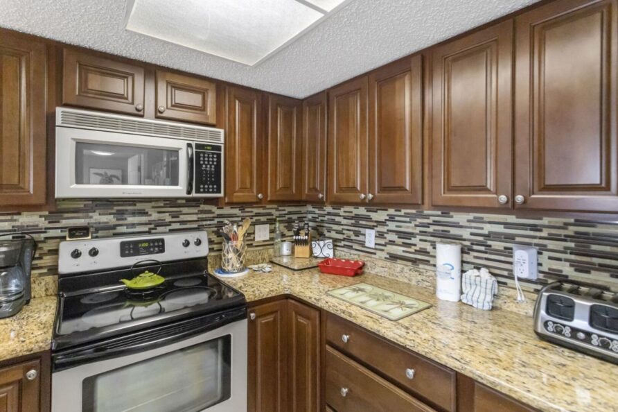 FGS107 condo bedroom with ocean-inspired decor