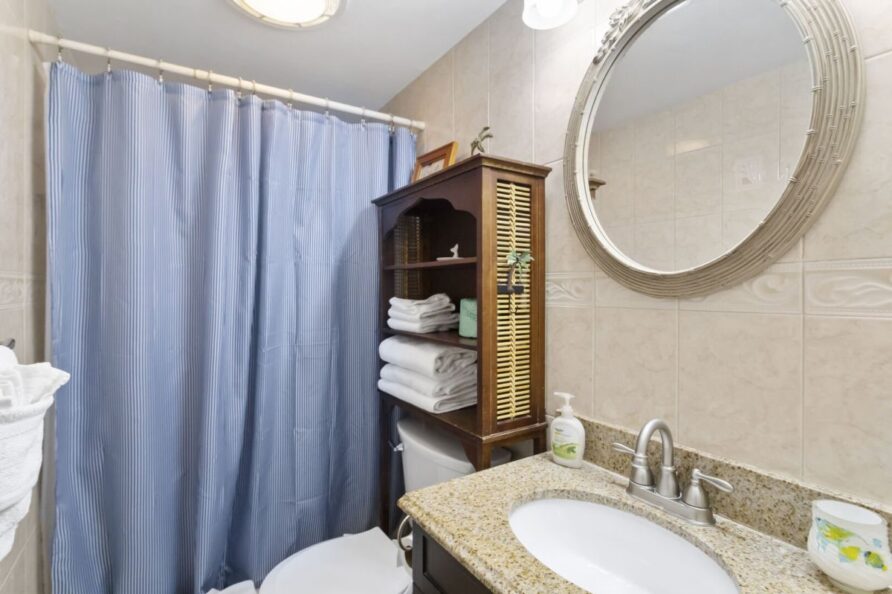 Bathroom tile and fixtures - beachfront condo